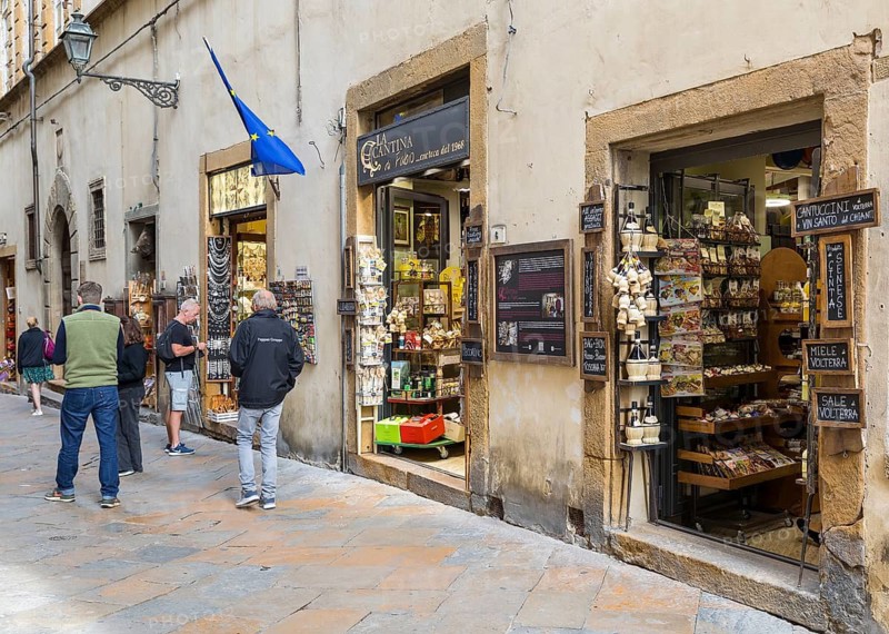 Many small shops in the historic centre of Volterra, province of Pisa, Tuscany, Italy