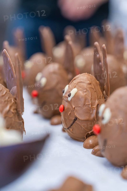 Chocolate delicacies moulded like bunnies with red and white details, Easter baking and chocolate icing at Haselstaller Hof, Gechingen, Black Forest, Germany