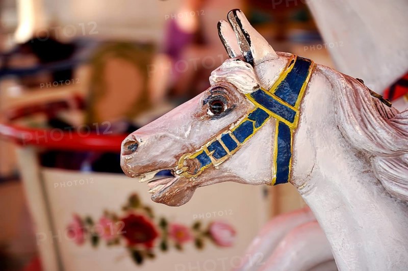 Painted wooden horse in an old children's carousel, historic Wies'n, Oide Wiesn, Oktoberfest, Munich, Upper Bavaria, Bavaria, Germany