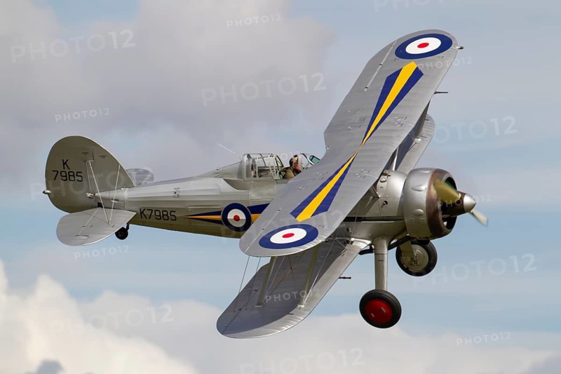 Gloster Gladiator biplane aircraft in RAF Royal air force colours flying, England, United Kingdom
