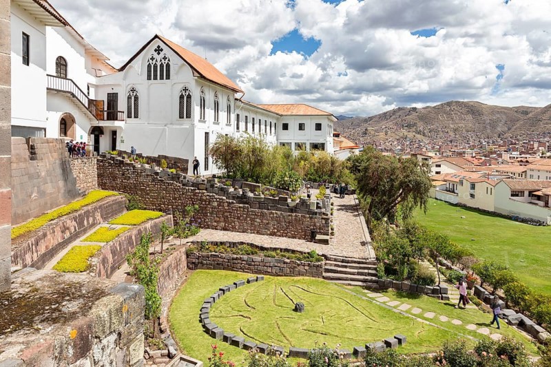 Courtyard, garden, monastery of Santo Domingo and church built on the Golden Temple of Coricancha Inca ruins, Cusco, Peru