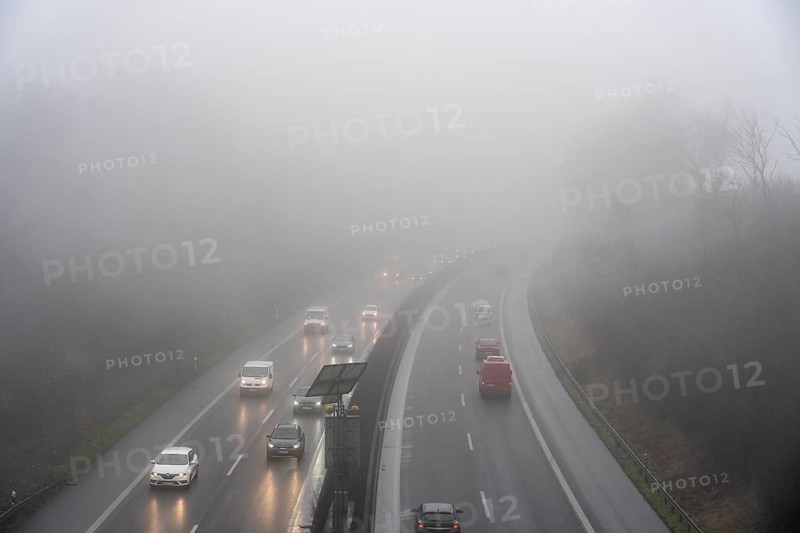 Dense fog, with visibility sometimes less than 100 metres, A52 motorway, in Essen, North Rhine-Westphalia, Germany