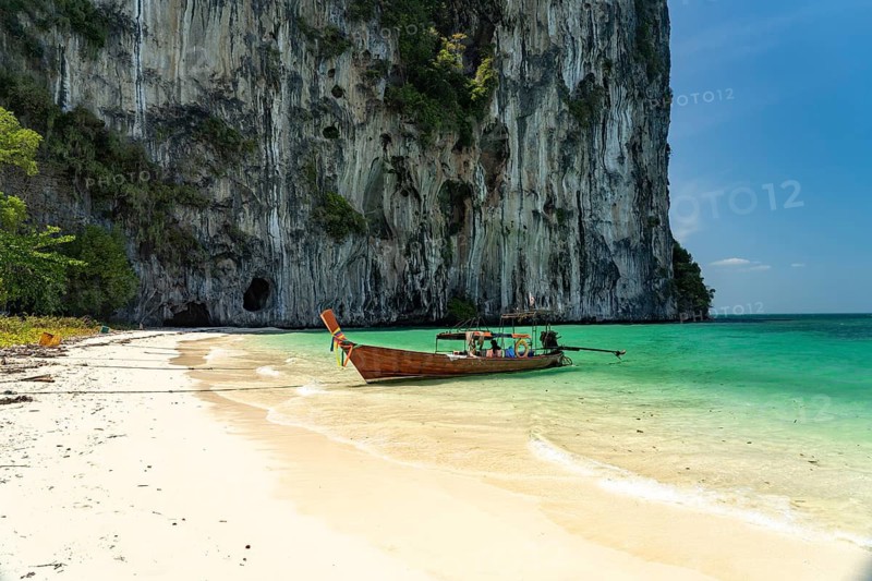 Long-tail boat on the beach of Koh Lao Liang Island, Thailand