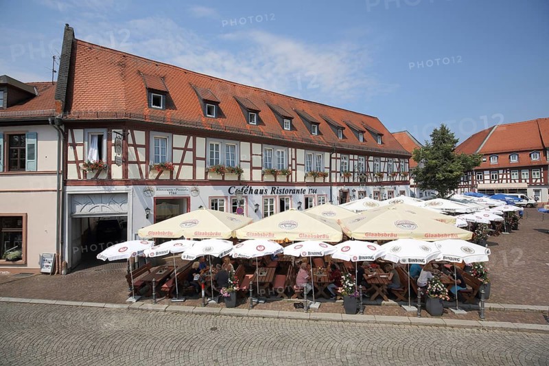 Street restaurant Cafe Ristorante with parasols, view from above, people, Freihofsplatz, Seligenstadt, Hesse, Germany