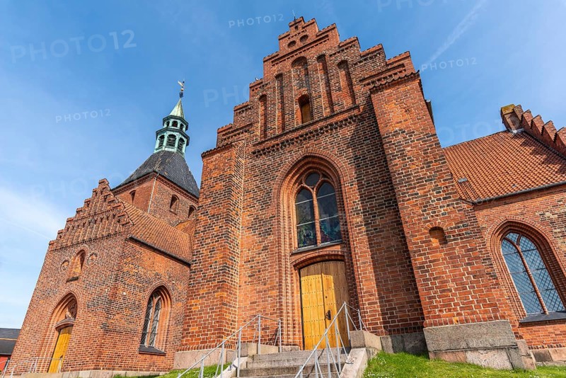 Svendborg Old Town, Vor Frue Kirke, Church of Our Lady, brick building, stepped gable, gothic windows, church tower, entrance, island of Funen, Denmark
