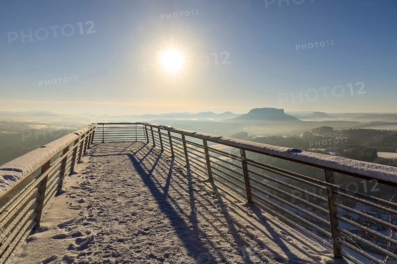Floating viewing platform of the Basteiaussicht on a winter morning, light fog lies over the Elbe valley and the table mountains, such as the Lilienstein, Saxon Switzerland, Saxony, Germany