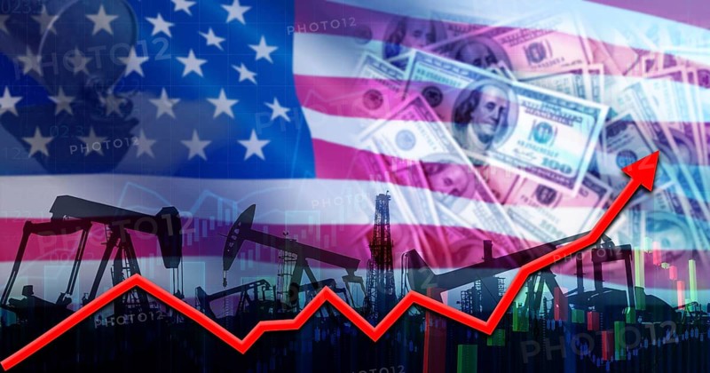 Oil rise with the US flag. Oil production with USA flag. Oil pumps with the USA flag