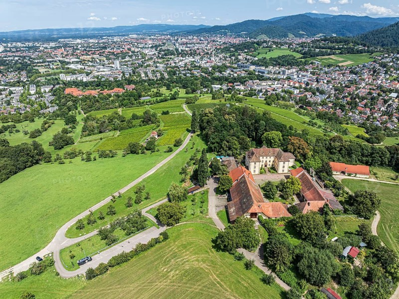Aerial view of castle Jesuitenschloss Merzhause and city Freiburg, Germany