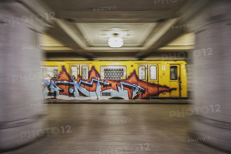 A graffiti-covered underground train enters the Rüdesheimer Platz underground station in Berlin, 27 February 2024. The Berlin public transport company (BVG) has announced strikes for Thursday and Friday