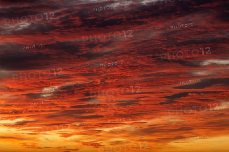 Orange-red coloured cloudy sky after sunset, cloud formation, evening sky, sunset, Baden-Württemberg, Germany