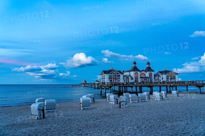 The pier of Sellin, evening mood, sunset, 394 metres long, with restaurant, jetty, beach chairs, island of Rügen, Mecklenburg-Western Pomerania, Germany