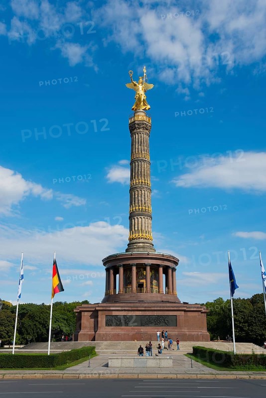 The Victory Column in Berlin, with golden figure under a clear sky, some tourists can be seen, Victory Column on the Great Star, Berlin, district Tiergarten, Germany