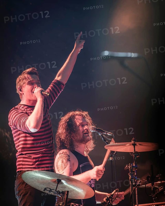 Sebastian Madsen (singer) and Sascha Madsen (drummer) from Madsen live at Heute Nacht! 20th anniversary album debut tour in Berlin's Columbiahalle on 12/04/2025
