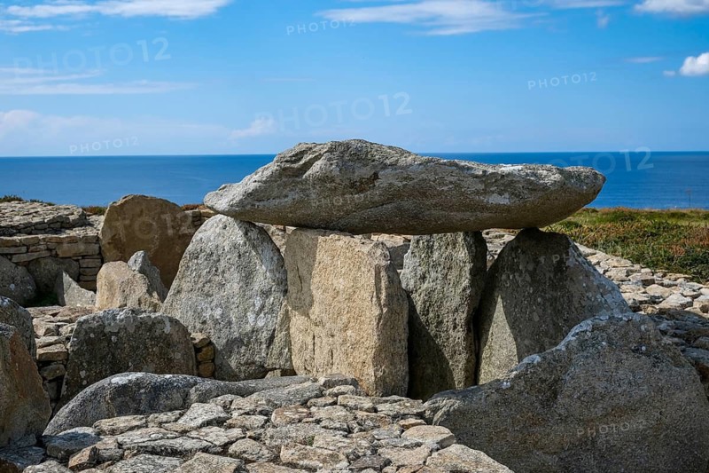 Plouhinec, Brittany, France - Dolmen tomb, dolmen of the Pointe du Souc'h at the information centre Centre d'interprétation de Menez Dregan, a dolmen is a prehistoric tomb made of stone blocks (megaliths), several megalithic sites have been discovered in Plouhinec. The various monuments from the Palaeolithic and Neolithic periods can be visited along a 1.5 kilometre coastal footpath to Pors Poulhan