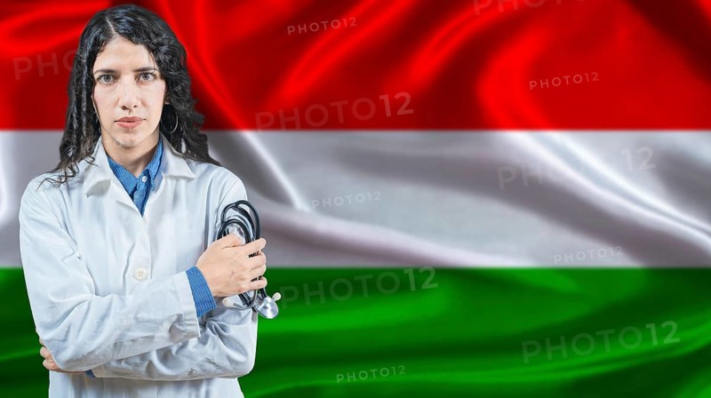 Hungarian national health system, Medical professional on Hungary flag background