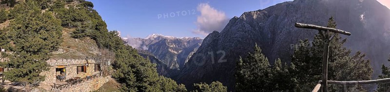 Panorama photo, snow-capped mountains, entrance to gorge, entrance, Xyloskalo, ranger, house in rock, Samaria Gorge, Omalos, Lefka Ori, White Mountains, West Crete, island of Crete, Greece