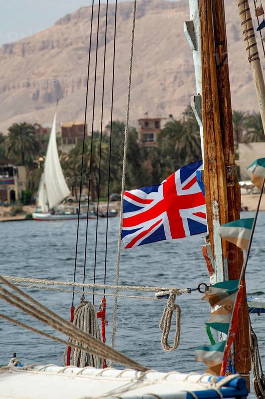 Luxor, Egypt. February 14th 2009 The British Union Jack flag flying from an Egyptian Felucca sail boat on the River Nile at Luxor, Egypt
