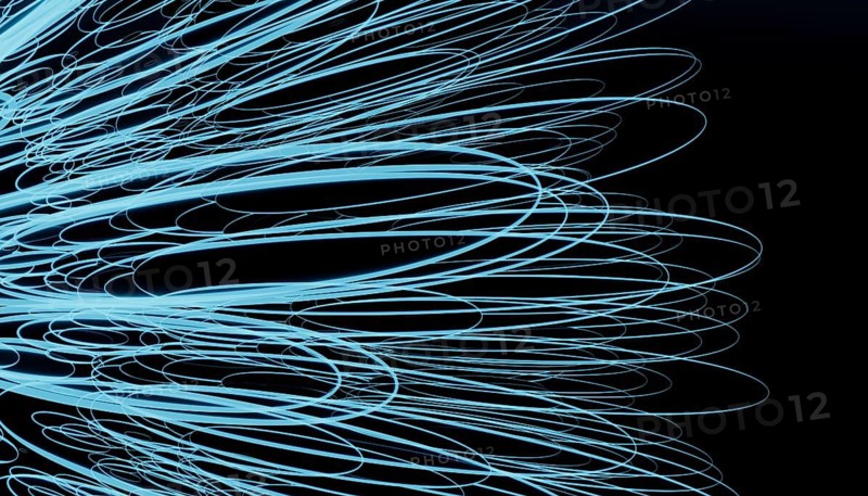 This image features a 3D render of intertwining light strands in a fluorescent blue hue against a dark background, creating a visually captivating abstract pattern