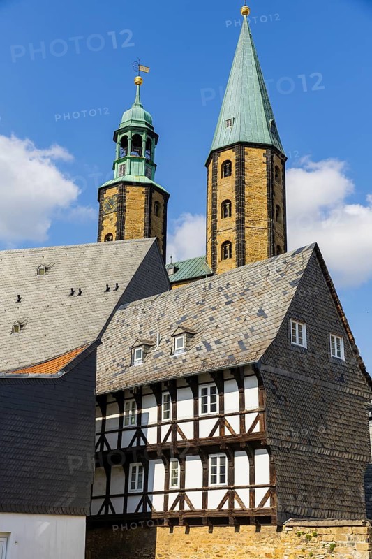 Artful half-timbered houses in the old town with a view of the Goslar Market Church of St Cosmas and Damian, Old Town, Goslar, Lower Saxony, Germany