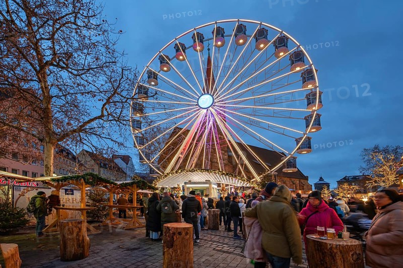 Winter village with Ferris wheel, Christmas market at Jakobsplatz, Nuremberg, Middle Franconia, Bavaria, Germany