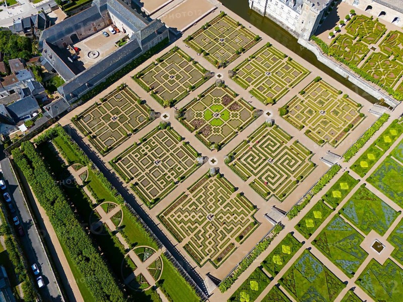 Geometric gardens with manicured paths, symmetrically arranged as part of a castle complex, aerial view, Villandry Castle, Renaissance, Tours, Loire Valley, Centre-Val de Loire, France