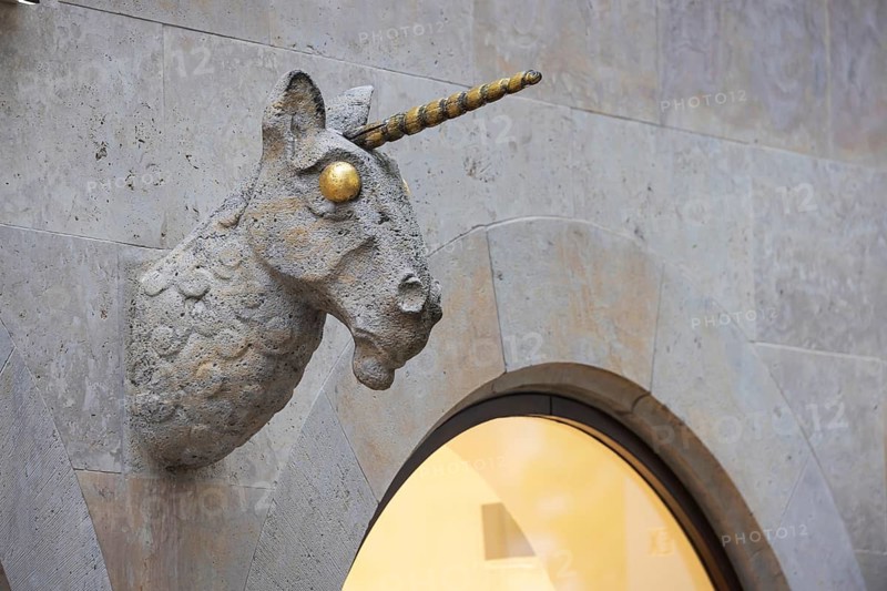 Unicorn bust, stone sculpture, shop in the old town centre of Bamberg, Upper Franconia, Bavaria, Germany