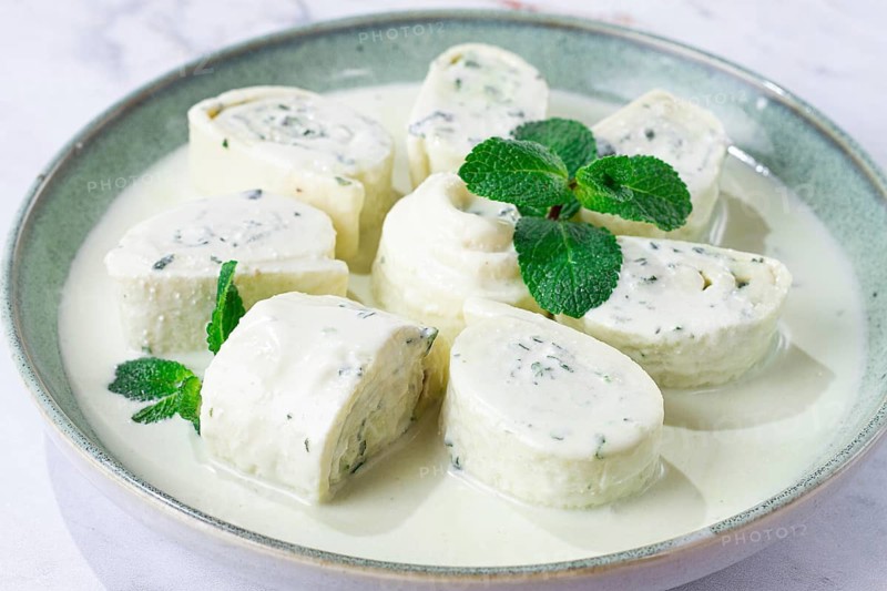 Gebjalia, Megrelian dish, cold appetizer of cheese with mint, Georgian traditional cuisine, homemade