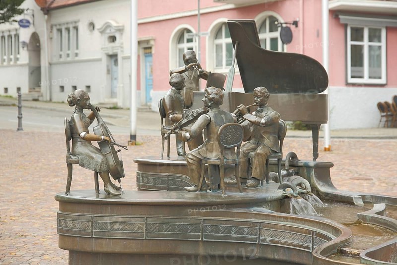 Musikantenbrunnen by Bonifatius Stirnberg 1989, modern art, sculpture group, violinist, viola, piano player, flute player, horn player, orchestra, making music, musical instruments, Donaueschingen, Südschwarzwald, Black Forest, Baden-Württemberg, Germany