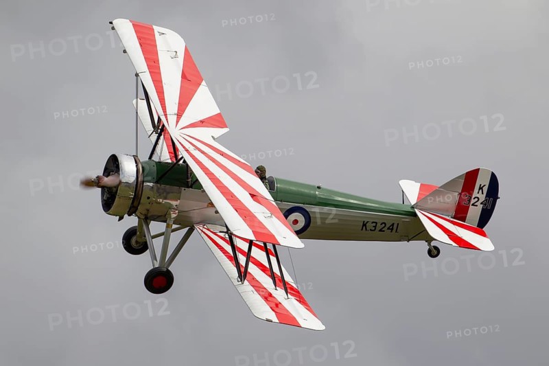 Avro 621 Tutor biplane aircraft in RAF Royal air force colours flying, England, United Kingdom
