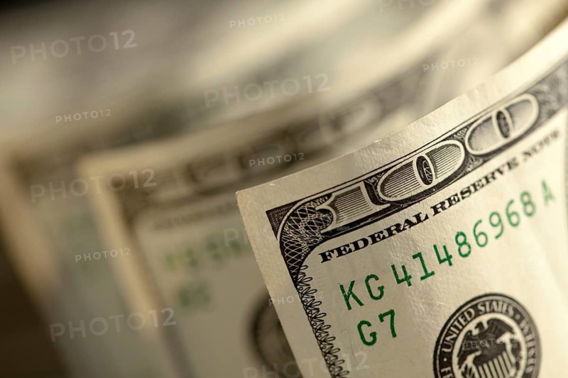 Abstract of one hundred dollar bills with narrow depth of field