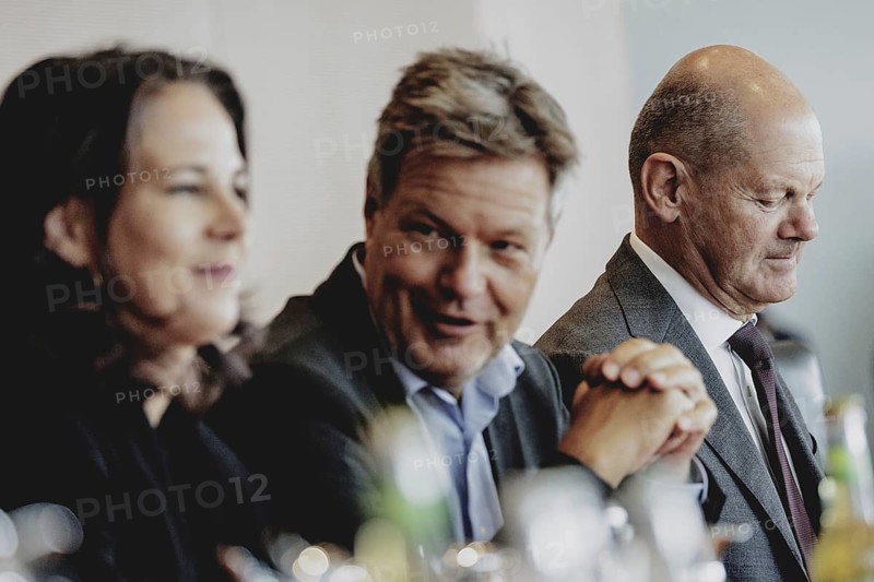 (R-L) Olaf Scholz (SPD), Federal Chancellor, Robert Habeck (Alliance 90/The Greens), Federal Minister for Economic Affairs and Climate Protection and Vice-Chancellor, and Annalena Bärbock (Alliance 90/The Greens), Federal Foreign Minister, pictured during the weekly cabinet meeting in Berlin, 21 August 2024
