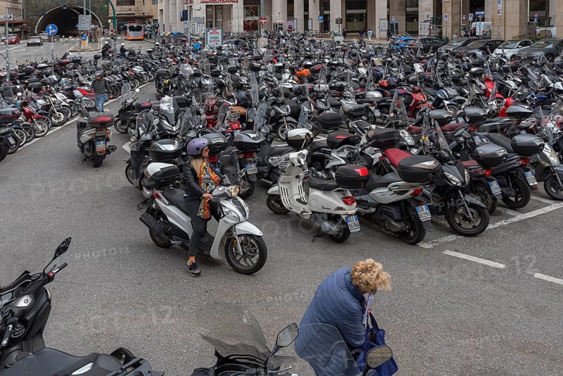 Large car park for scooters in the city, Genoa, Italy