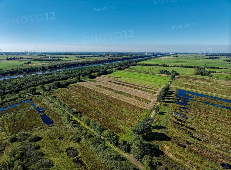 Aerial view of the Kiel Canal and the landscape on both sides. Burg, Dithmarschen, Schleswig-Holstein, Germany