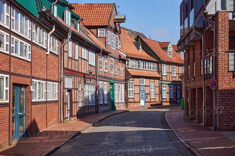 Old half-timbered houses and brick buildings along a street in the historic centre of Stade, Hanseatic city, district of Stade, Lower Saxony, Germany
