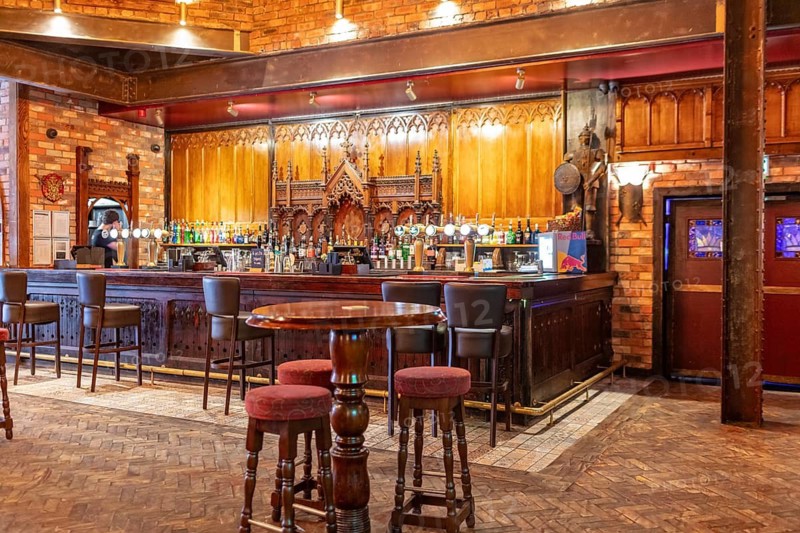 Traditionally furnished bar with a wooden counter and cosy atmosphere, Liverpool