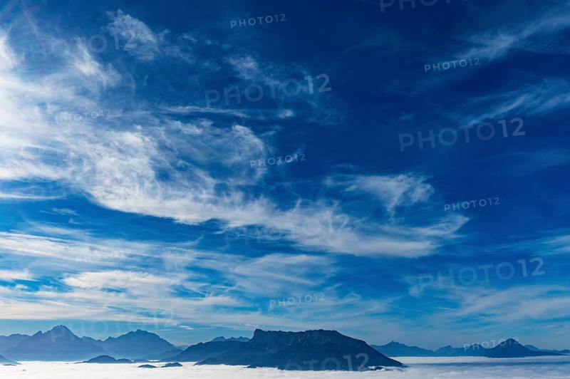 View from Schwarzenberg to a sea of fog in the Salzach valley with Untersberg, Osterhorn group, Salzkammergut, Salzburg province, Austria