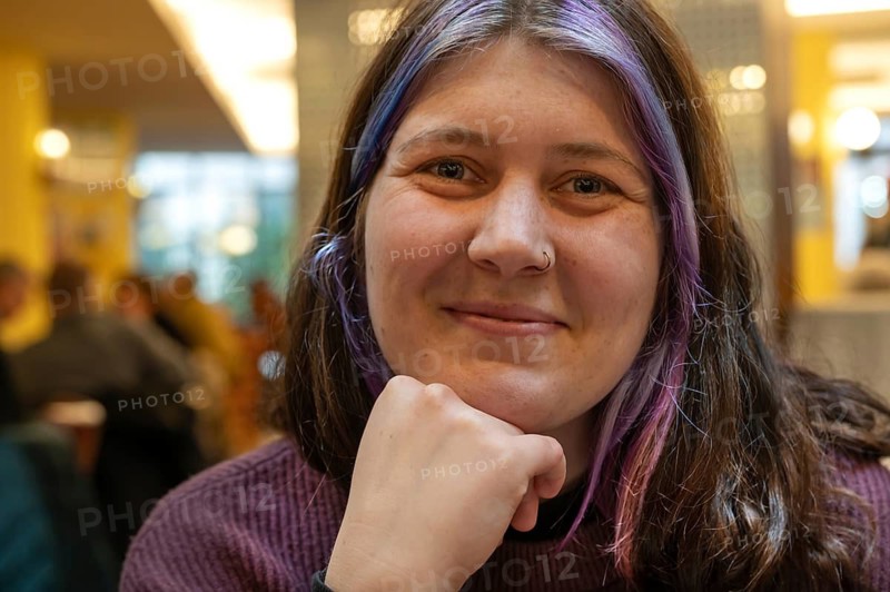 Portrait of a smiling young woman with colourful dyed hair and nose piercing, Bavaria, Germany