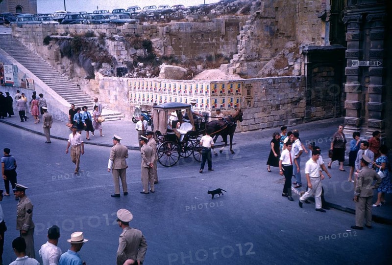Street scene with horse drawn taxi in Valletta, Malta 1960s