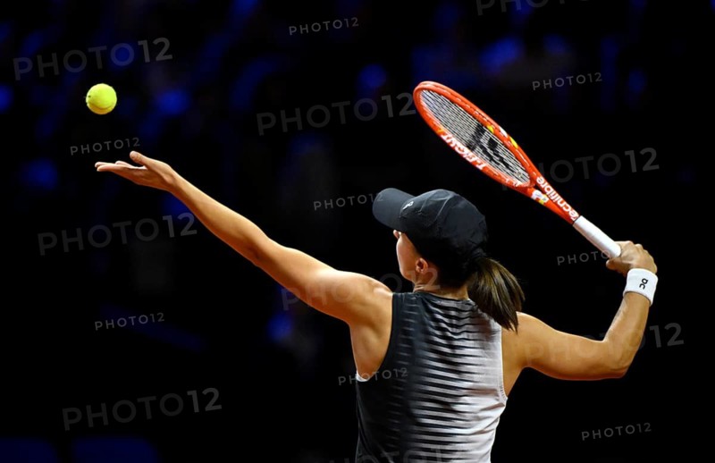 Action Serve Iga Swiatek (POL) Women's Porsche Tennis Grand Prix Porsche Arena, Stuttgart, Baden-Württemberg, Germany