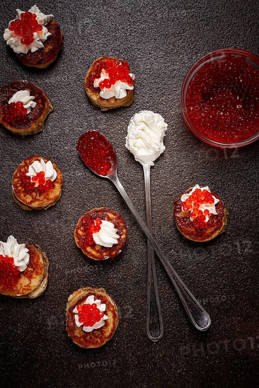 Demidoff pancakes, mini pancakes, with sour cream and red caviar, homemade, no people