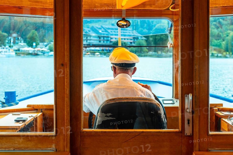 Captain of a pleasure boat in summer on Lake Titisee in the Black Forest, Germany