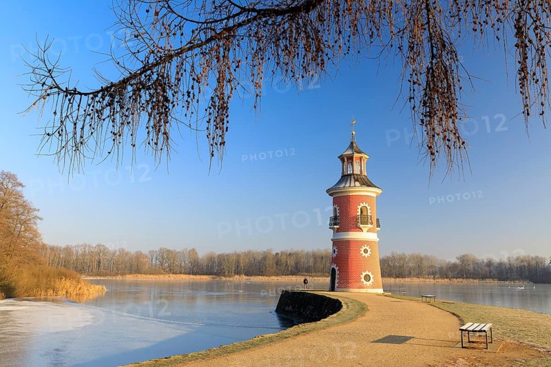 Pier with lighthouse on the large pond near the Fasanenschlößchen, Moritzburg, Saxony, Germany