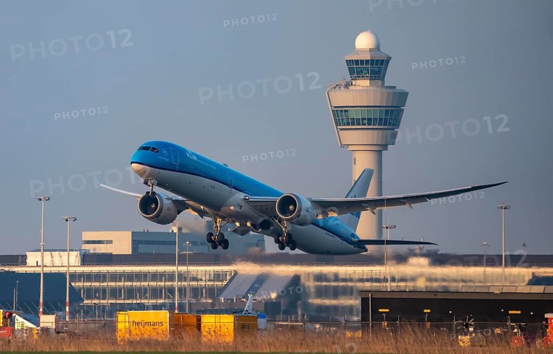 KLM Boeing 787-10 Dreamliner, aircraft taking off from Kaagbaan runway, 06/24, at Amsterdam Schiphol Airport, AMS, Air Traffic Control Tower, Netherlands
