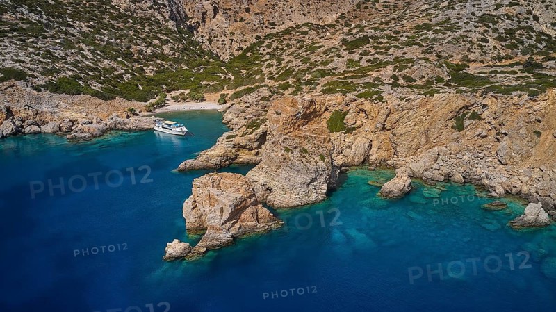 Palatia Beach, Palatia, Clear blue water and rocks in a quiet bay with boats, boat tour Saria, Saria Island, Karpathos, Dodecanese, Greek Islands, Greece