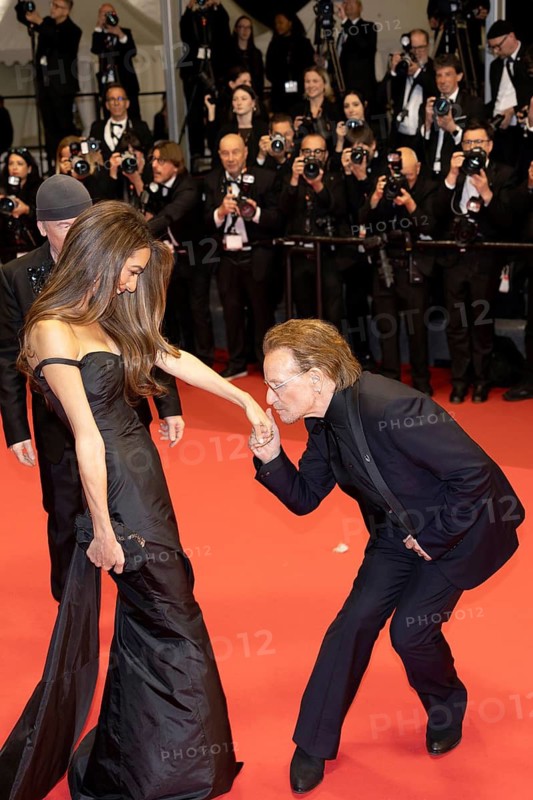 Cannes, France - 16.5.2024: Amal Clooney and U2 singer Bono during the Bono: Stories Of Surrender red carpet during the 78th Cannes International Film Festival. The film festival takes place from 13 to 24 May 2025