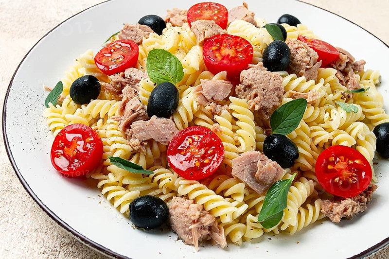 Tuna salad, fusilli pasta, olives and cherry, olive oil, homemade
