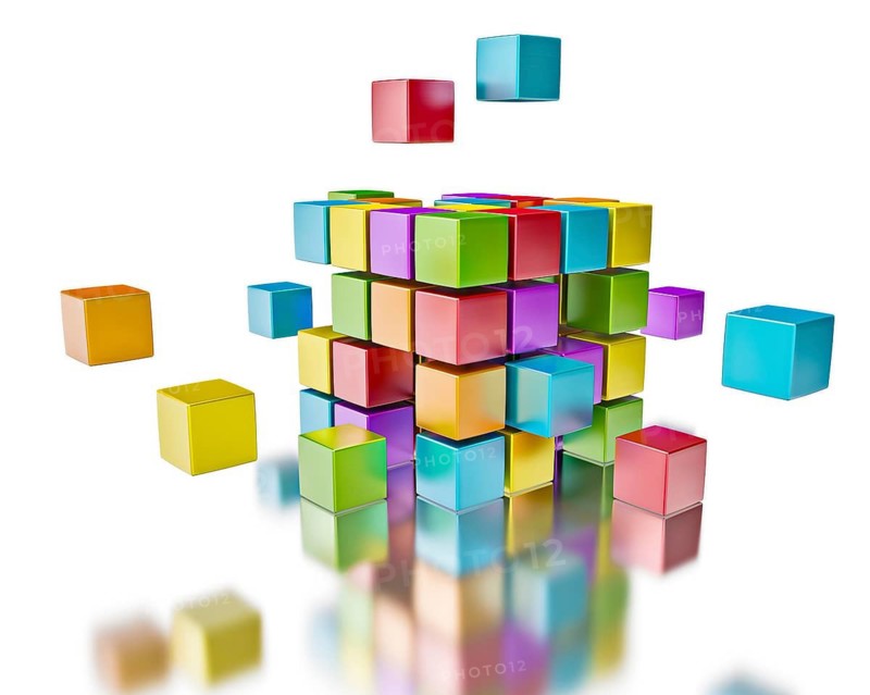 Business team teamwork collaboration concept, colorful color cubes assembling into cubic structure isolated on white with reflection