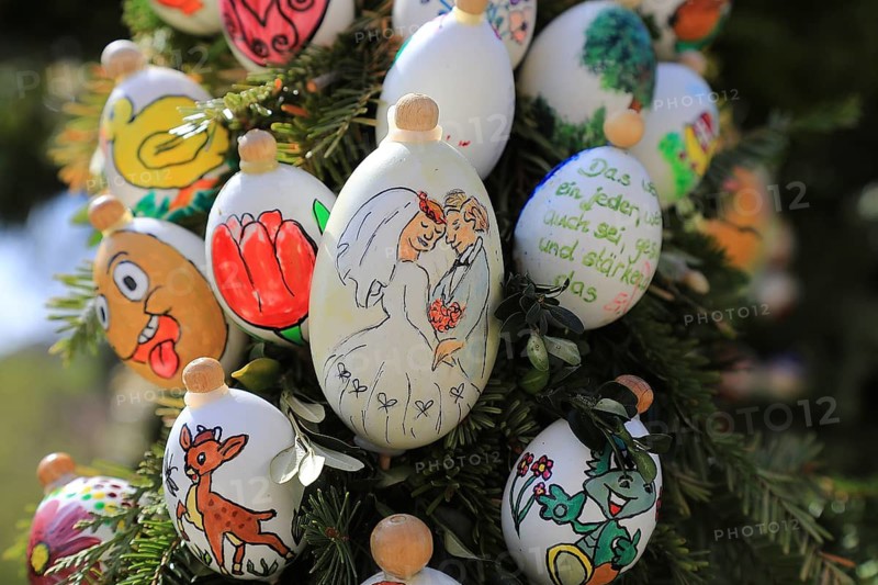 Easter fountain, Franconian Switzerland, Heiligenstadt, Bamberg district, Upper Franconia, Bavaria, Germany, detail of an Easter decoration, eggs painted with a wedding motif