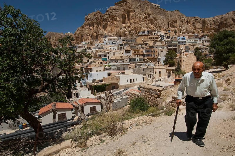 Maaloula, Syria. July 5th 2009 An old Syrian man walking in the mixed Christian and Muslim Aramaic speaking village of Maaloula just outside Damascus, Syria