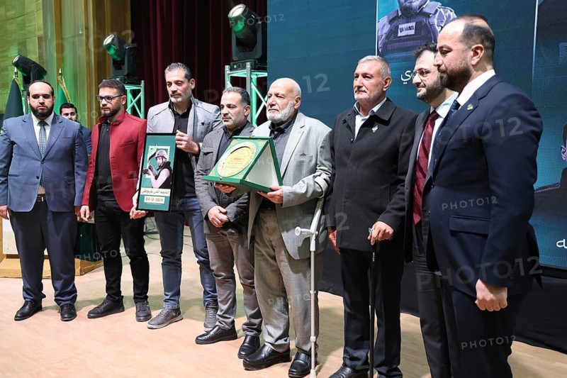 DAMASCUS, SYRIA - DECEMBER 6, 2025: Ministers and high-ranking officials of the newly formed Syrian government attend a symbolic ceremony to honor the families of victims who lost their lives during the Syrian war. The event, held in the capital Damascus, aims to provide social and symbolic recognition to the relatives of those fallen during the conflict as part of the country's transitional or commemorative phase, Damascus, Damascus, Syria